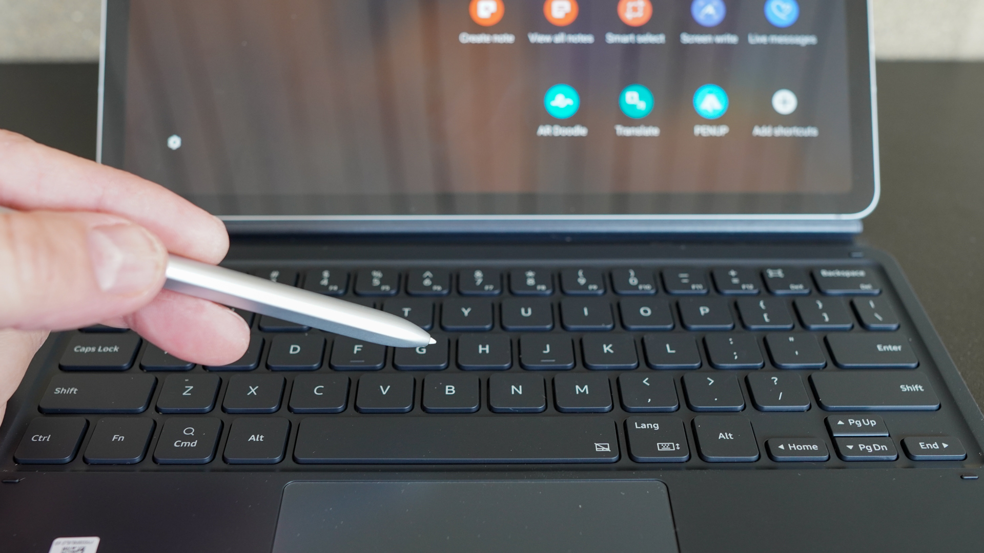 Samsung Galaxy Tab S7 S Pen in hand